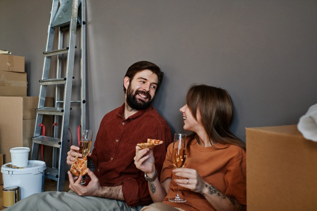Couple Celebrating Moving To Apartment